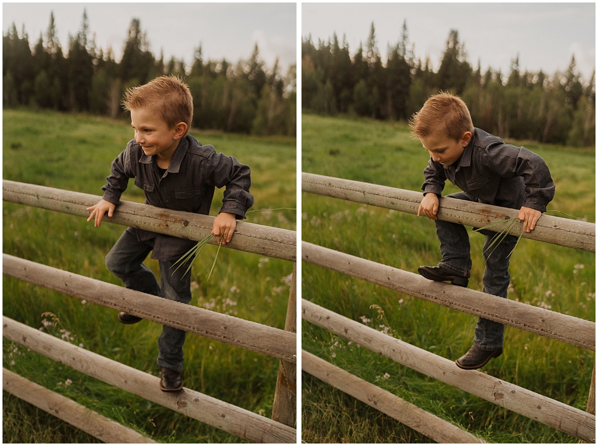 kid jumping off of a fence on a farm