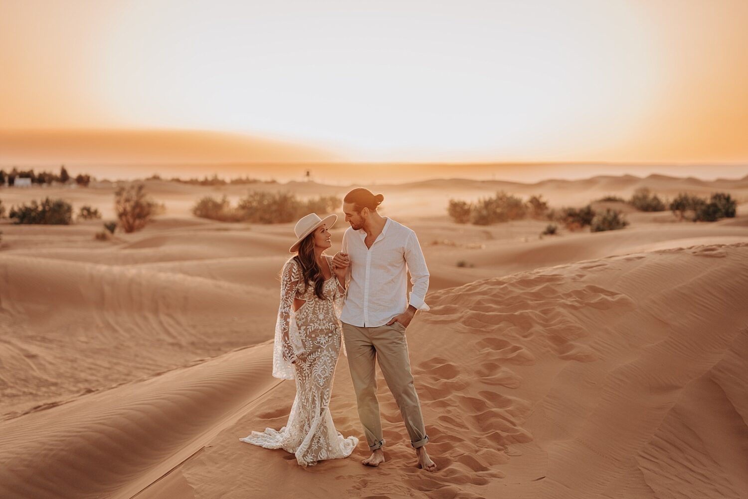 morroco wedding photographer bride and groom portraits in the Sahara desert at sunrise