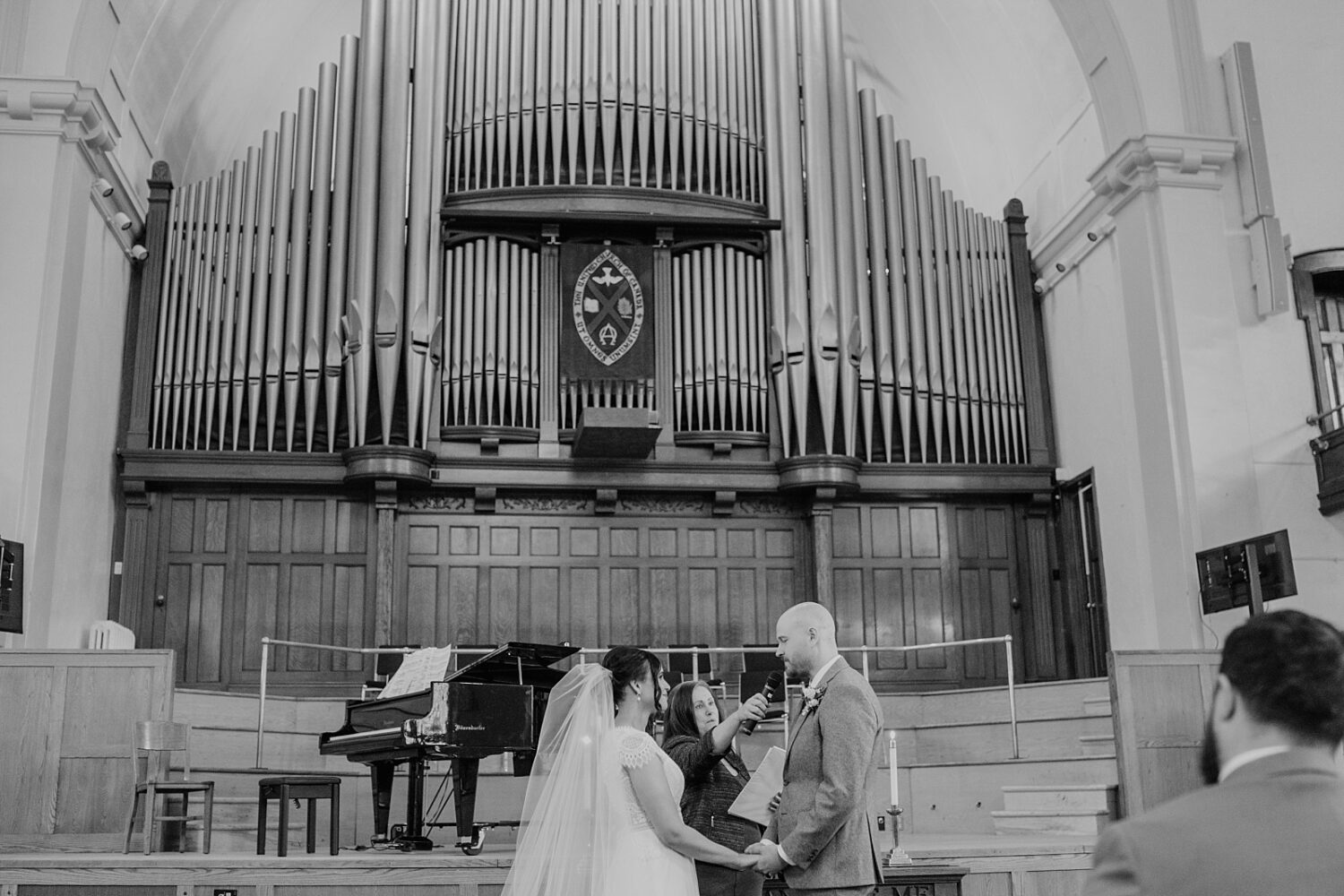 Edmonton wedding photographer bride and groom saying vows at McDougall Church